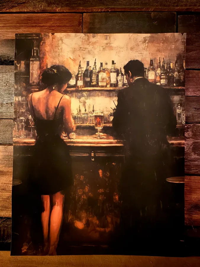 A painting of a couple at the bar, hung on the reclaimed wood wall